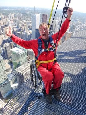 Rick experiencing CN Tower's accessible skywalk
