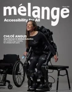 Magazine cover of Mélange, February 2024 edition, featuring Chloë Angus and Human in Motion Robotics. The cover highlights 'Accessibility for All' with a focus on redefining mobility for wheelchair users. Chloë Angus is shown wearing an advanced exoskeleton suit by Human in Motion Robotics, with a wheelchair in the background and a small remote control in her hand. She is in a standing position, looking confident and smiling