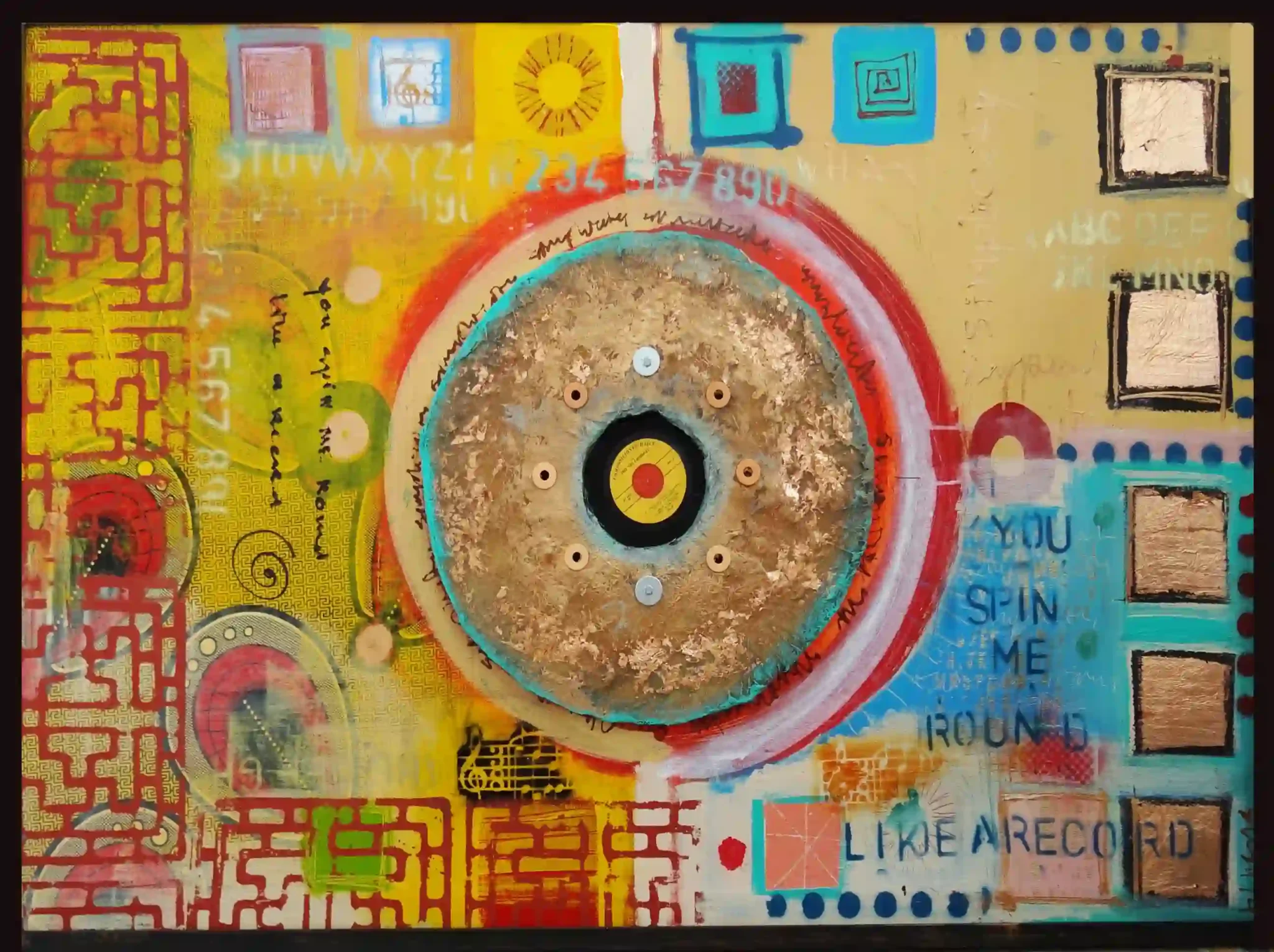 Abstract artwork featuring a large, circular gold-textured element in the center, surrounded by concentric rings in red, turquoise, and yellow. The background includes intricate patterns, symbols, and text, such as 'You spin me round like a record,' in various colors and fonts. The composition is layered with geometric shapes, grids, and scattered letters and numbers, creating a sense of movement and depth