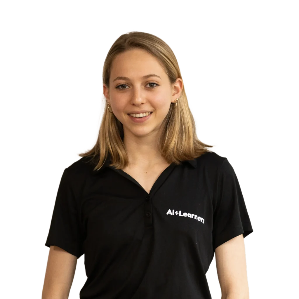 A person wearing a black polo shirt with "AI+Learners" logo, standing against a solid white background.