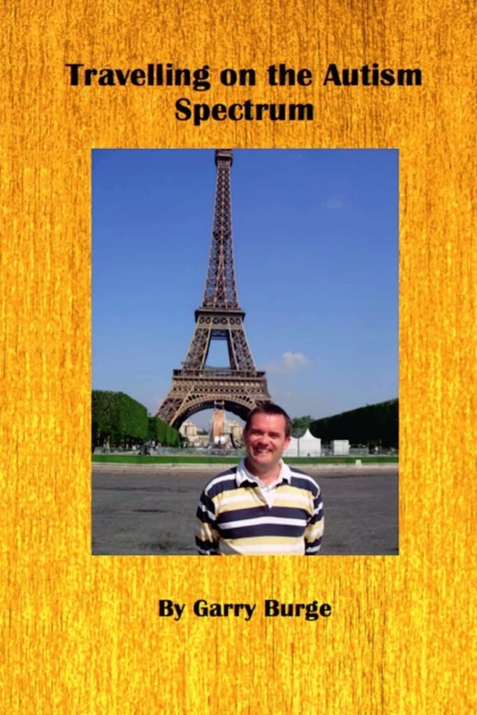 A book cover with a textured golden background, a large vertical rectangular photo in the center shows a smiling man in a striped polo shirt standing in front of the Eiffel Tower on a sunny day.