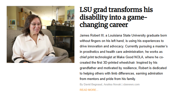 A woman with glasses and dark hair, wearing a light-colored top, smiles while sitting on a couch. The image is from an article about an LSU grad.