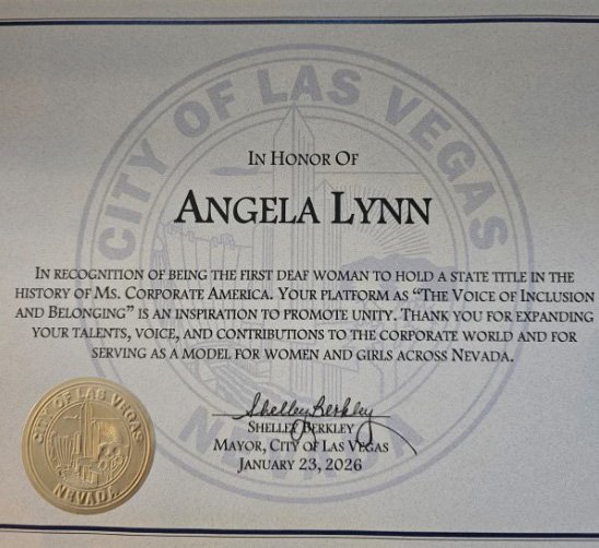Certificate of honor from the City of Las Vegas presented to Angela Lynn on January 23, 2026, recognizing her as the first deaf woman to hold a state title in Ms. Corporate America. The certificate commends her platform ‘The Voice of Inclusion and Belonging’ for promoting unity and serving as a role model for women and girls in Nevada. Signed by Mayor Shelley Berkley with the official gold seal of Las Vegas.