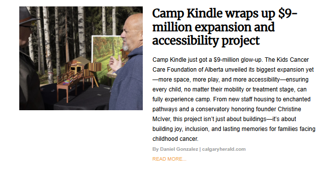A man in a hat talking to another man in a wooded area, with a small model of a playground structure between them. The article headline is "Camp Kindle wraps up $9-million expansion and accessibility project."
