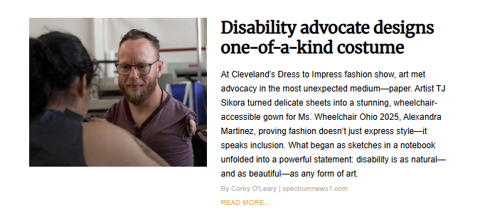 A candid photo accompanying the article "Disability advocate designs one-of-a-kind costume." The image shows Artist TJ Sikora, a white man with a beard, glasses, and forearms that end above the elbow, smiling warmly as he speaks with a woman whose back is mostly to the camera. They are indoors in what appears to be a studio or workshop setting. The article highlights Sikora's design of a wheelchair-accessible gown for Ms. Wheelchair Ohio 2025, Alexandra Martinez.